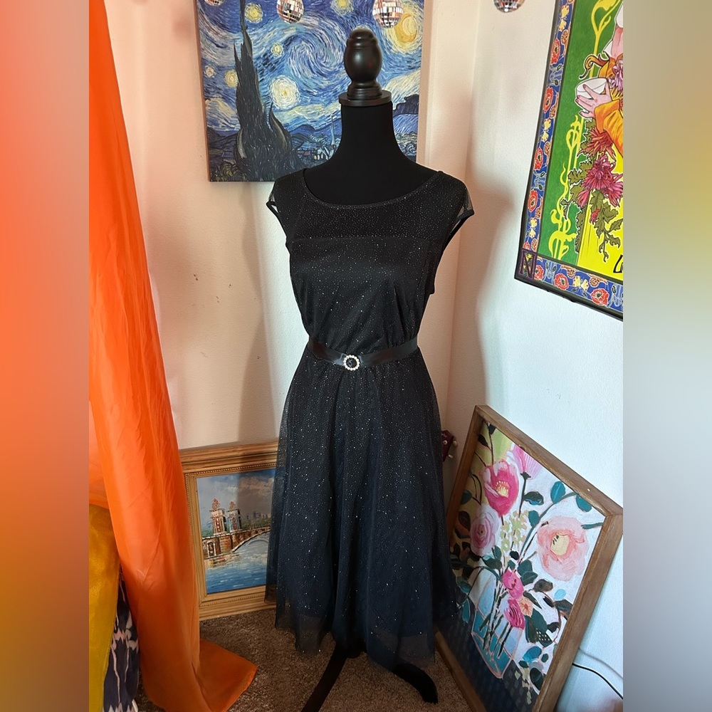Candalite Woman’s black gown